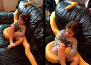 YouTube: Niña tiene como mascota a enorme serpiente pitón