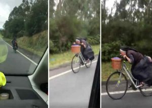 ¡Impresionante! Conductor graba a monja en bicicleta en plena carretera